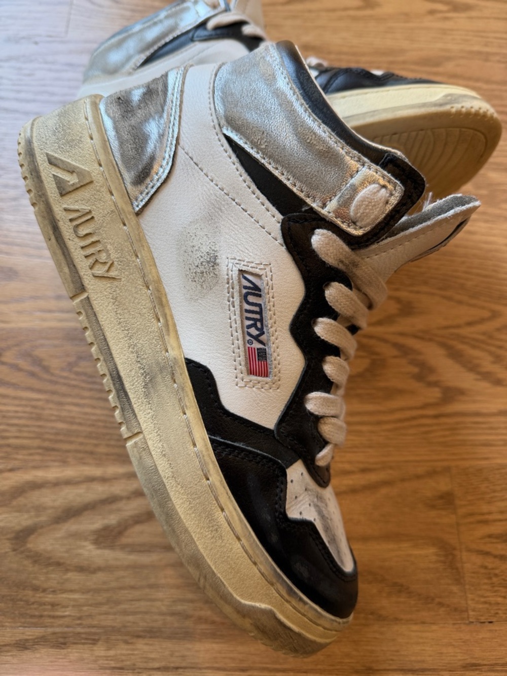 Autry Vintage Mid-Top Sneakers in White and Black